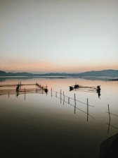 A serene morning at Drift Reservoir with anglers casting their lines over calm waters.