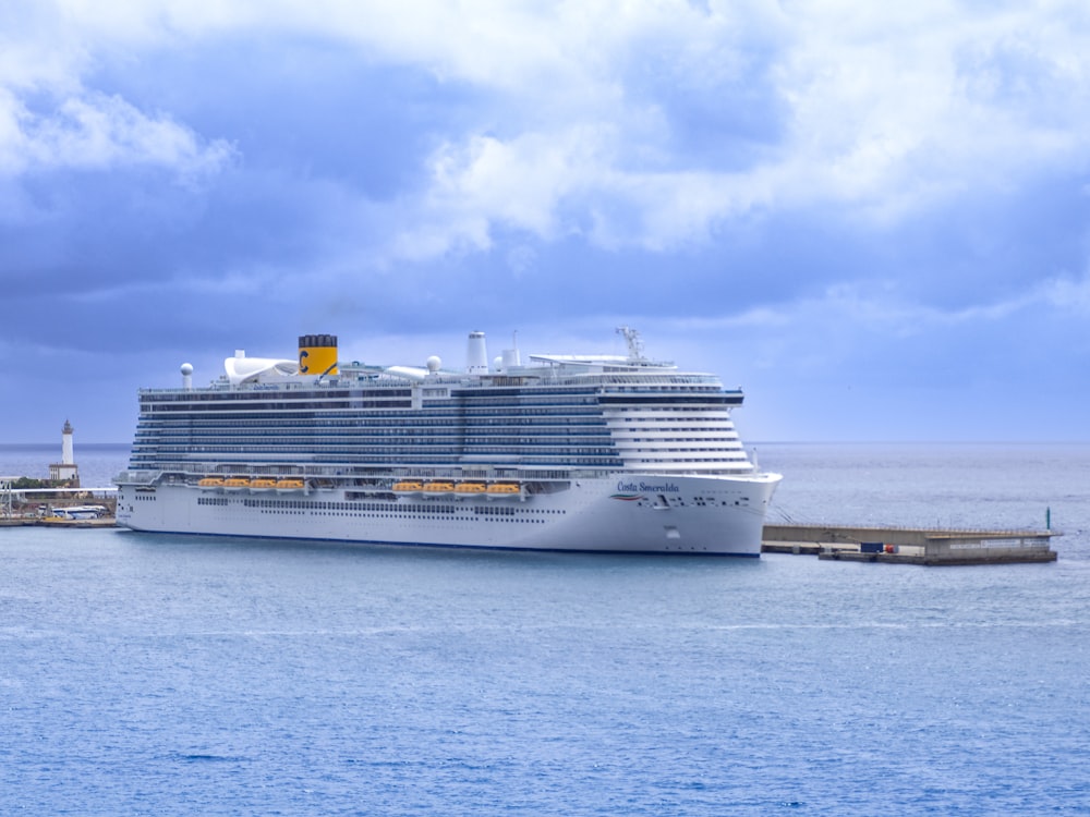 a large cruise ship in the middle of a body of water