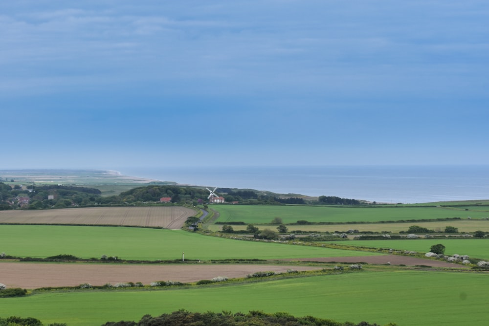 a view of the countryside from a hill