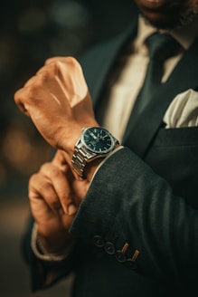 a close up of a person wearing a watch