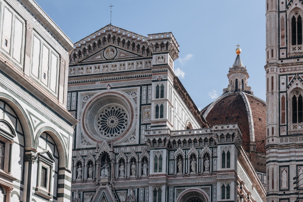 a large cathedral with a clock on it's side