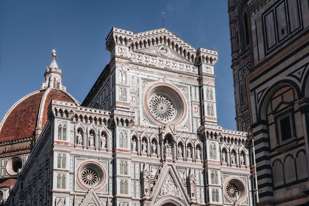 a tall building with a clock on the front of it