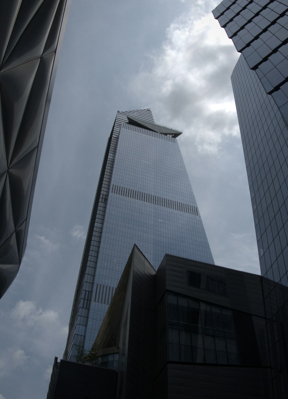 a view of a tall building from the ground