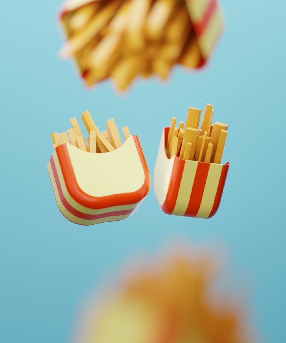 a close up of french fries and an umbrella