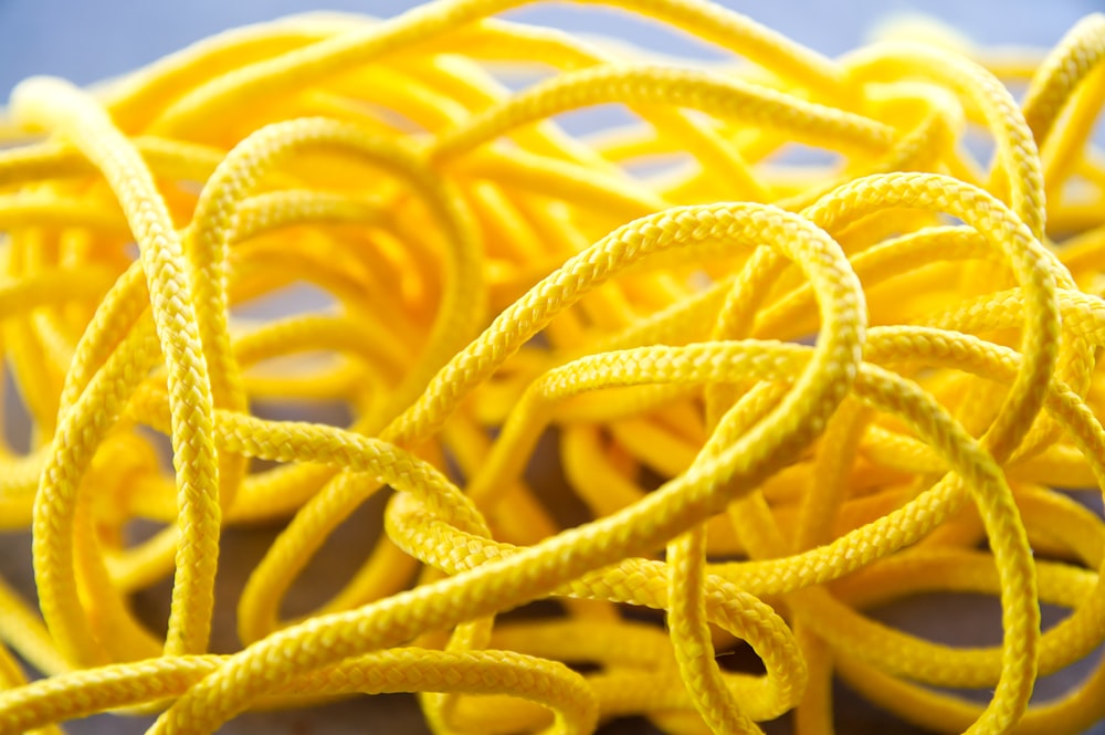 a bunch of yellow ropes on a table