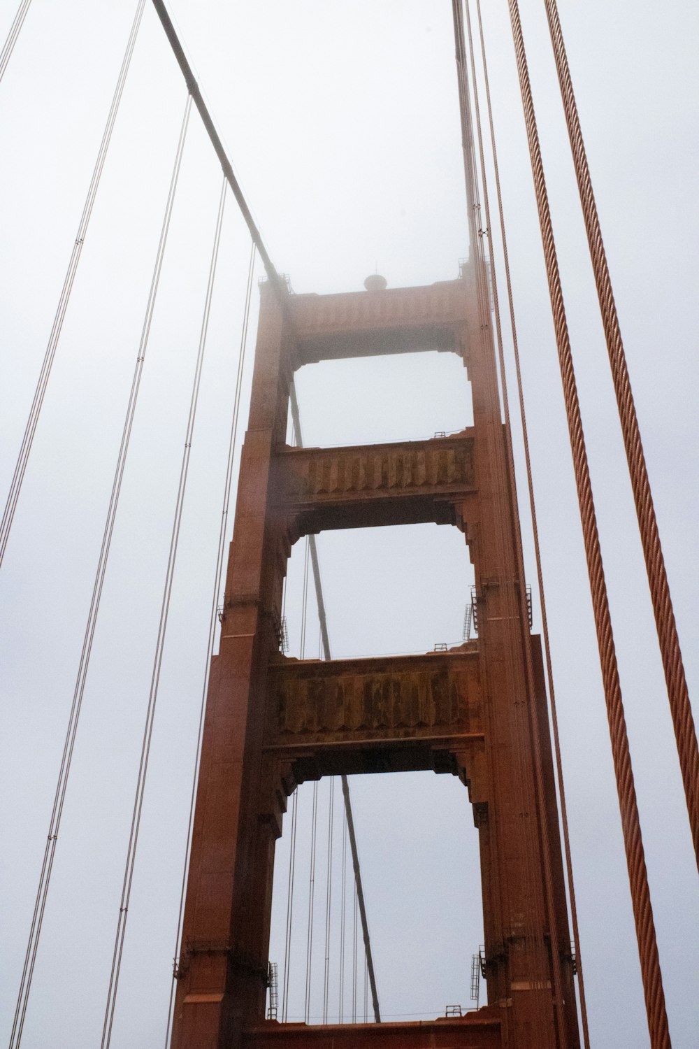 a view of the golden gate bridge on a foggy day