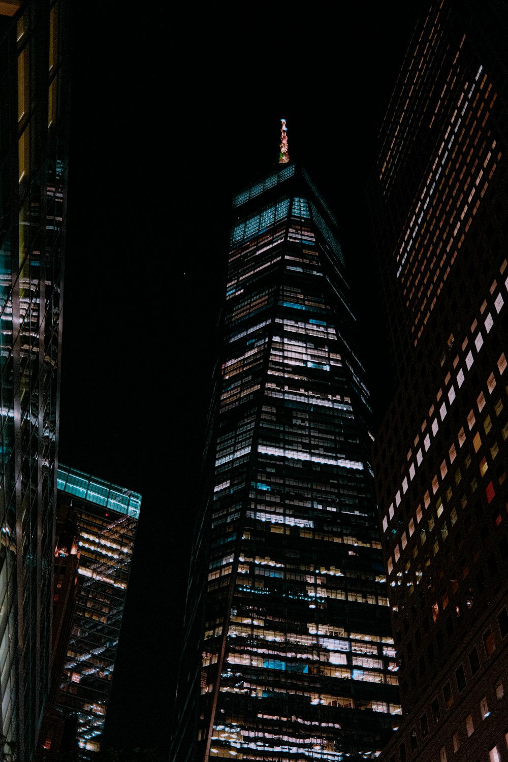 a very tall building lit up at night