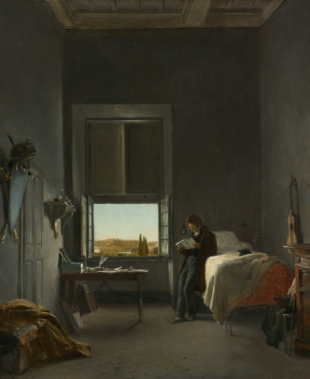 a painting of a man reading in a bedroom