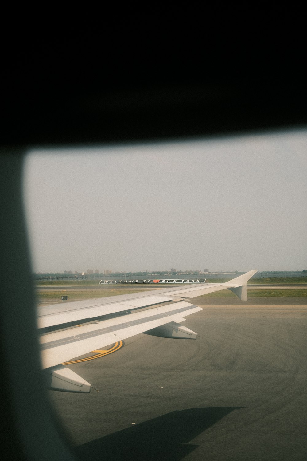 a view of an airplane wing from a window