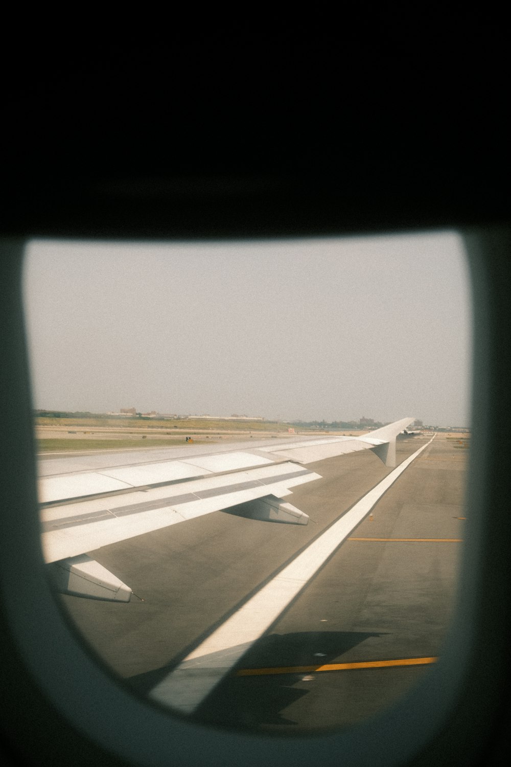 a view of the wing of an airplane from a window