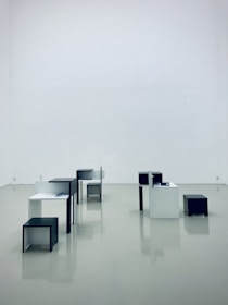 Various configurable furniture pieces displayed in a minimalist setting