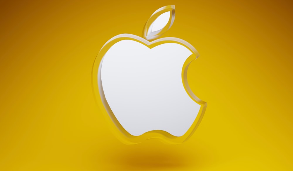 Un logotipo de Apple sobre fondo amarillo