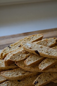 a pile of crackers sitting on top of a wooden table