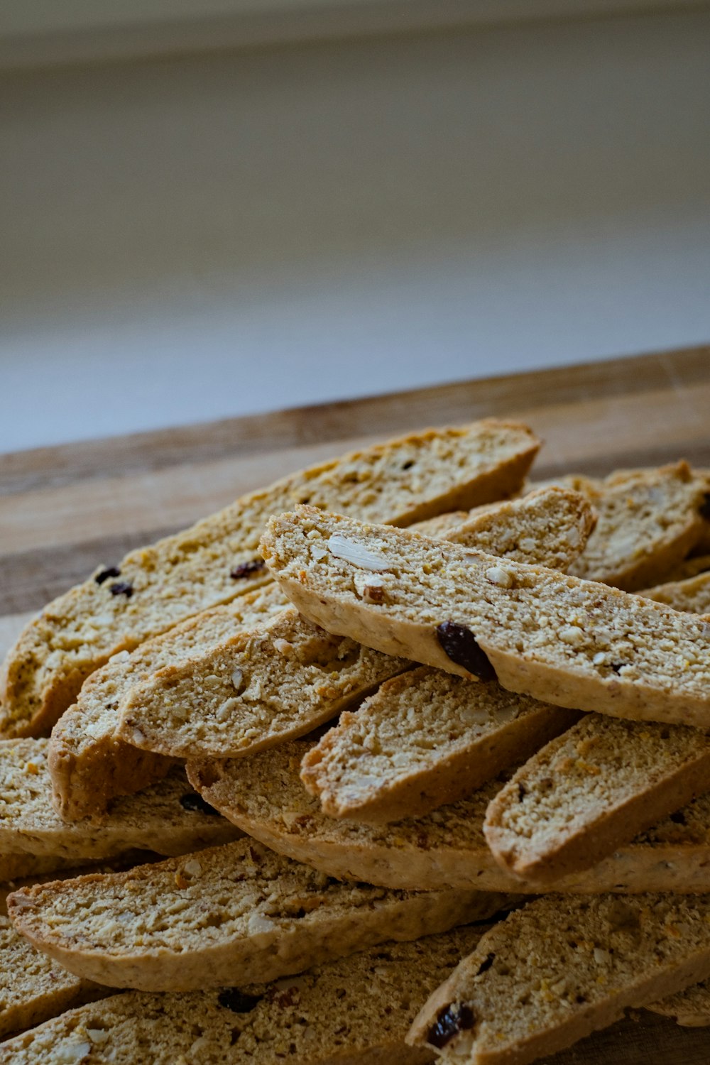 a pile of crackers sitting on top of a wooden table