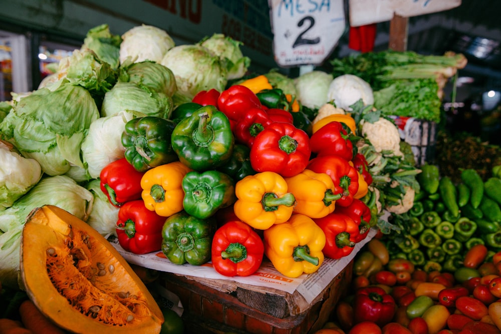 a pile of vegetables sitting on top of a table