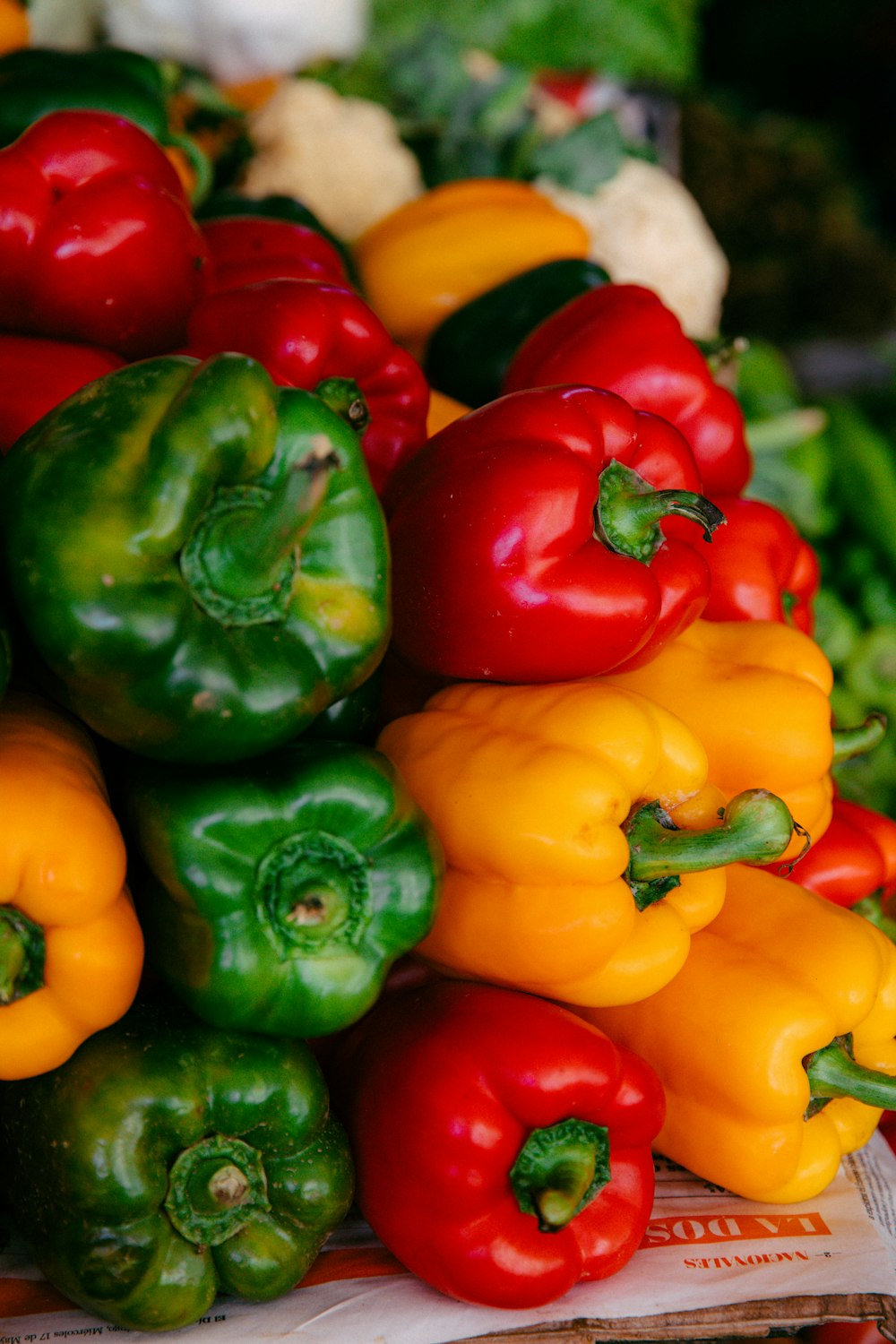 a pile of peppers sitting on top of a table