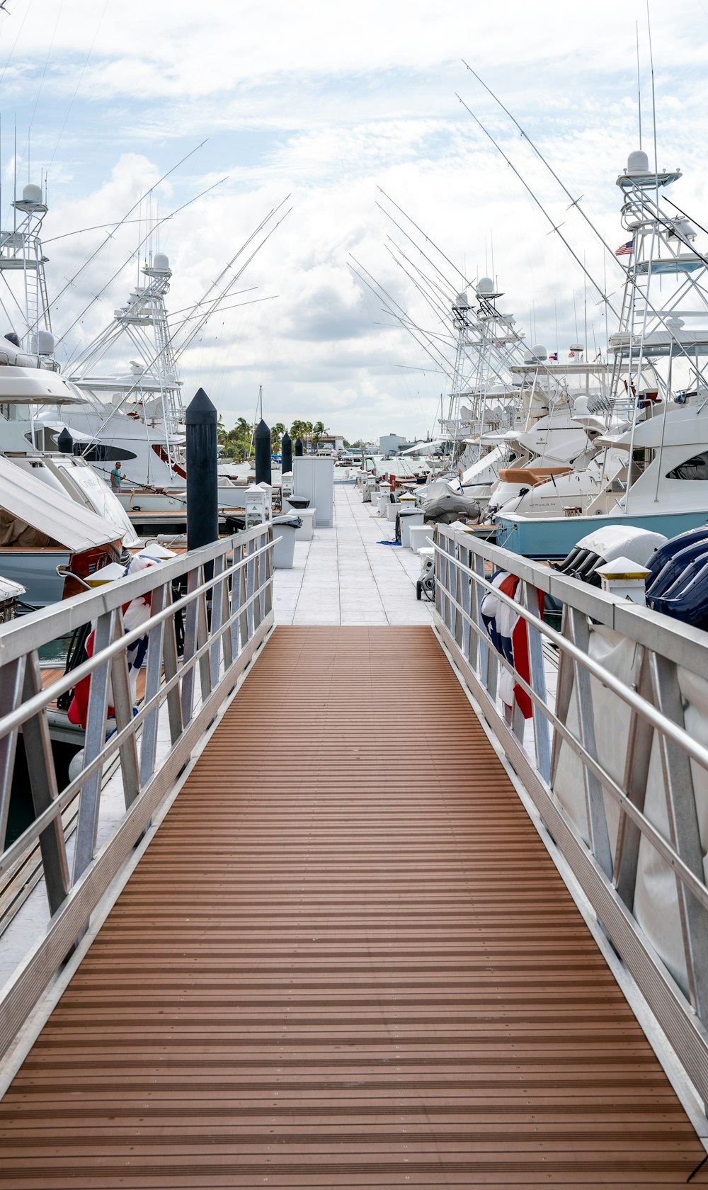 a dock with many boats docked at it