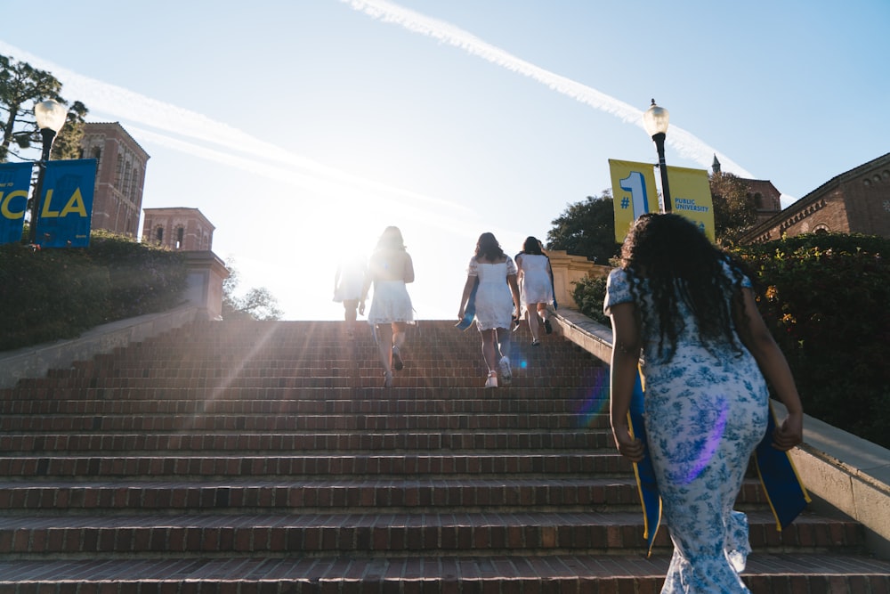 a group of people walking down a flight of stairs