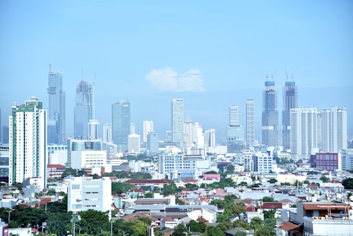 a view of a city with tall buildings