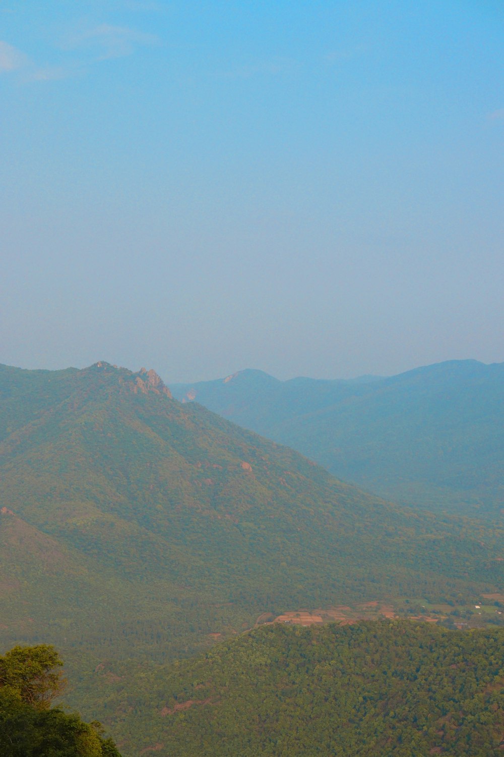 a view of a mountain range from a distance