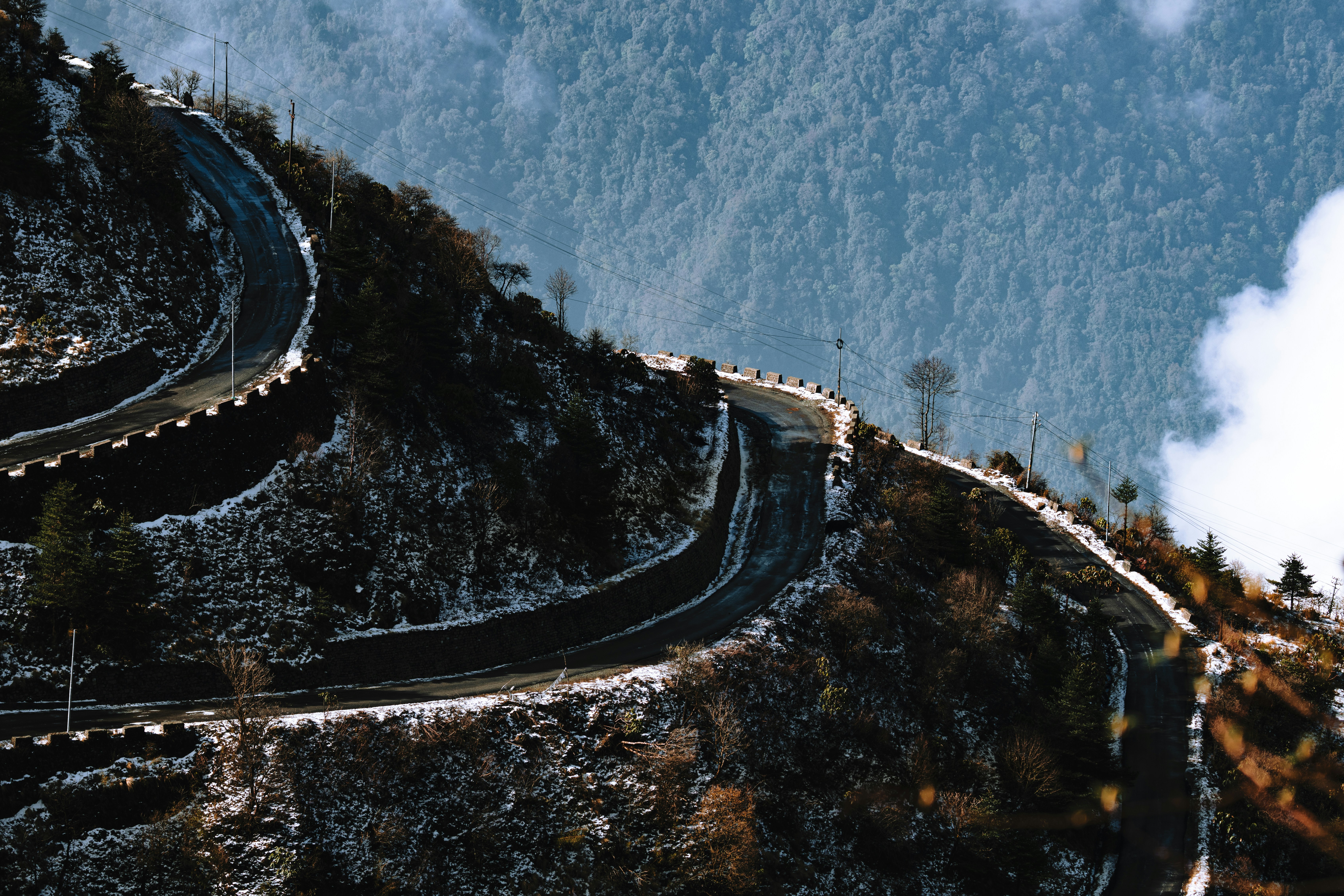 a winding road on the side of a mountain