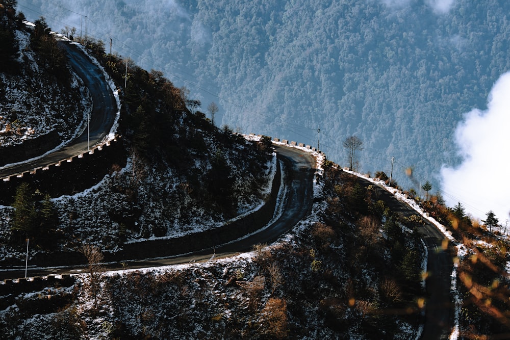 a winding road on the side of a mountain