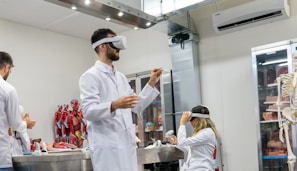 Students engaged in a virtual reality experience in a bright classroom setting.