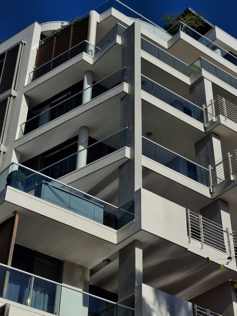 a tall building with balconies and balconies on the balconies