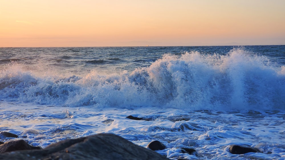 a large body of water surrounded by rocks