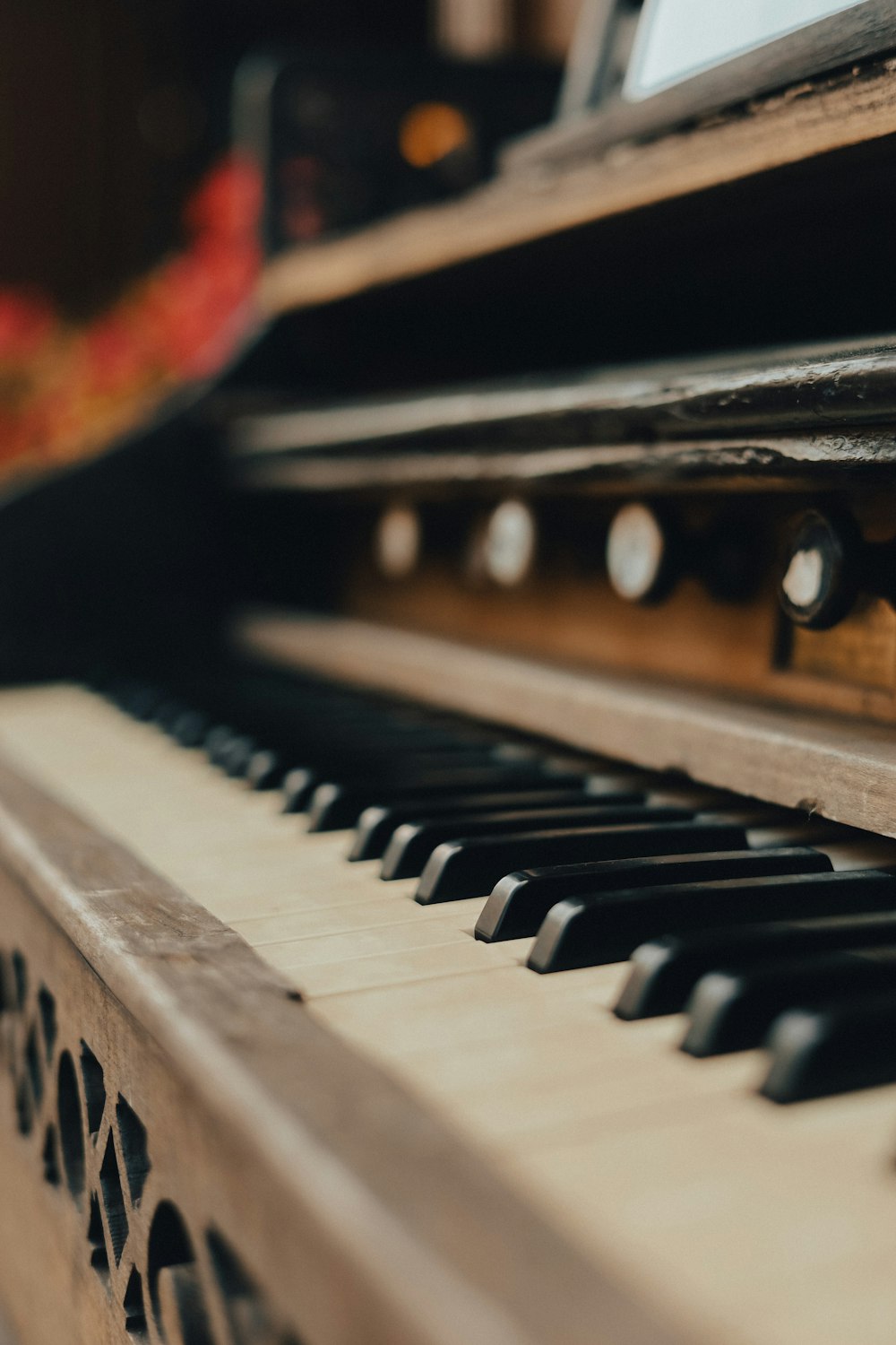 a close up of a piano with a keyboard