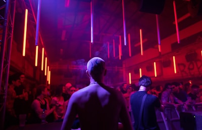 a man standing in front of a crowd of people