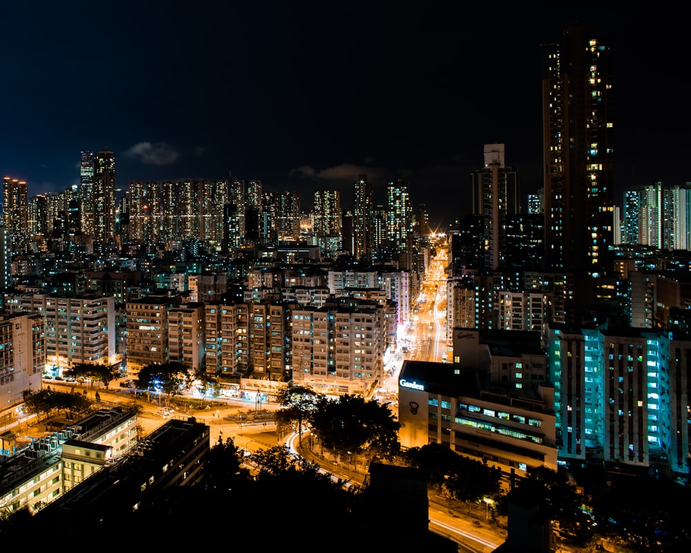 a view of a city at night from the top of a building