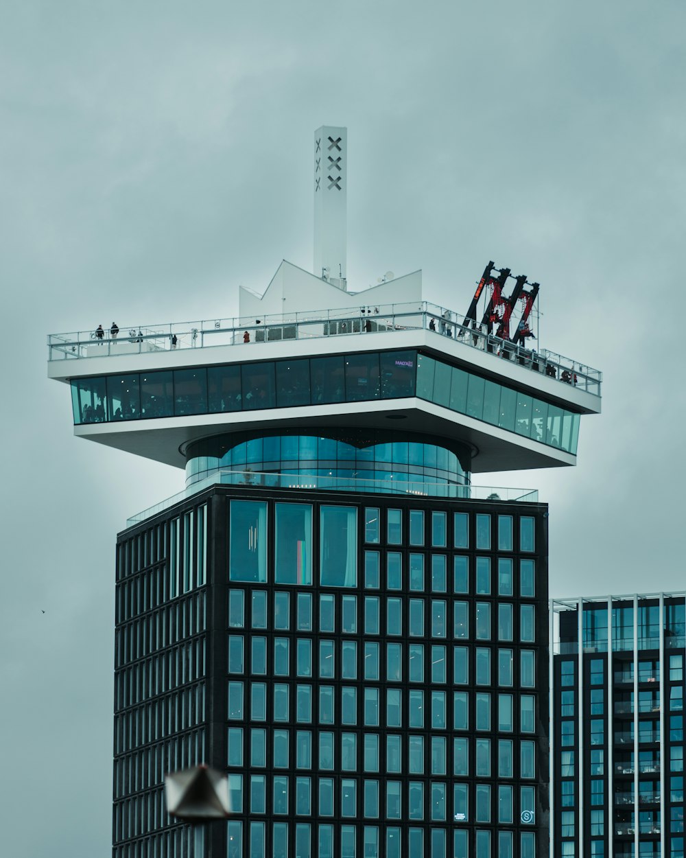 a very tall building with a clock on top of it