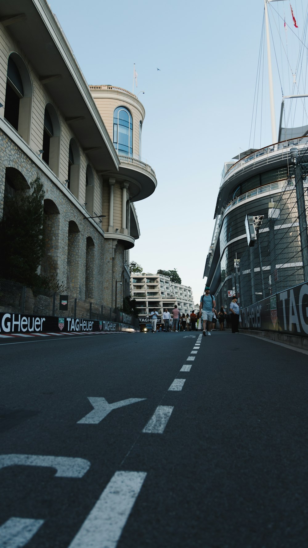 a view of a street in front of a large building