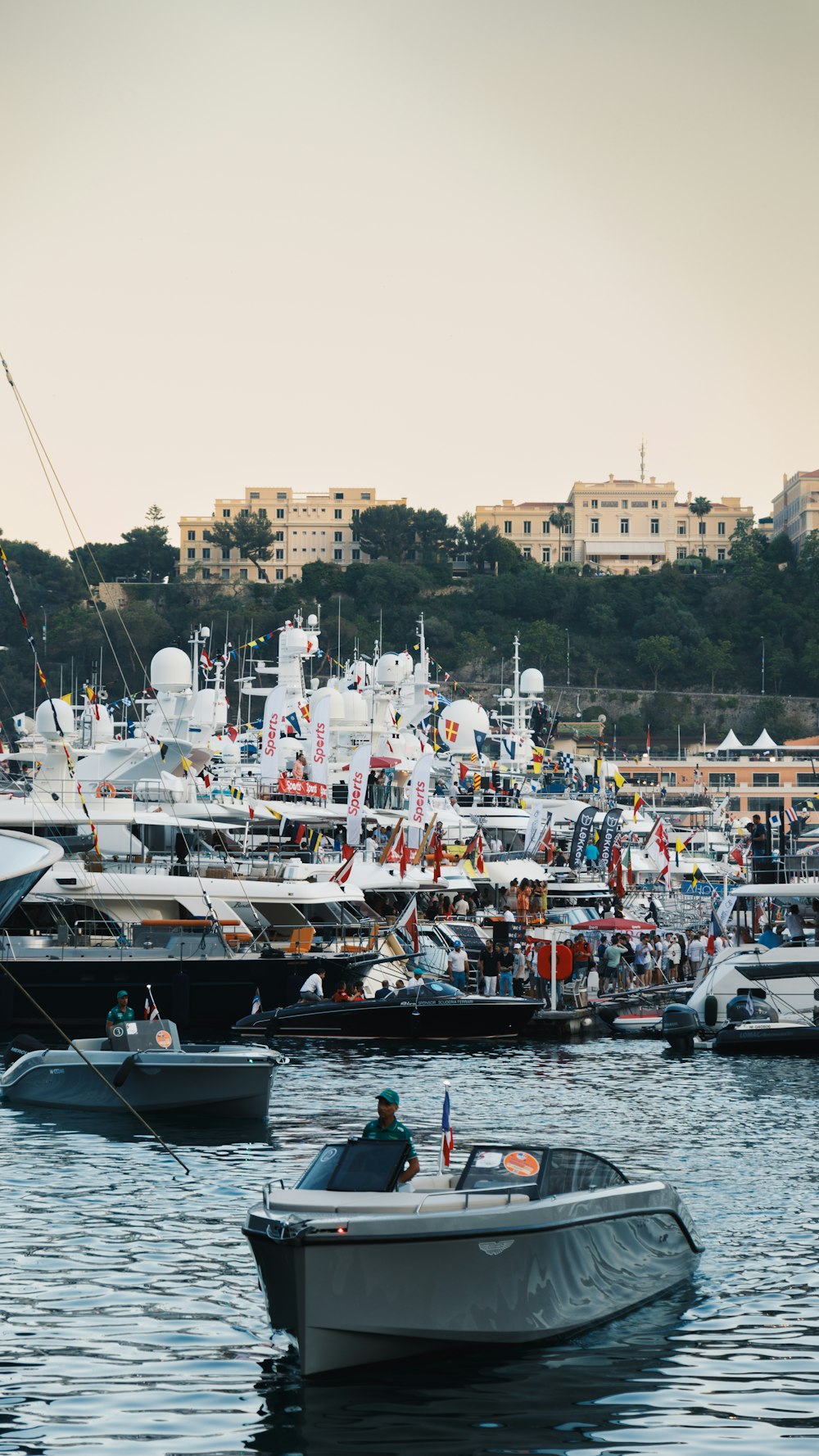 a group of boats floating on top of a body of water