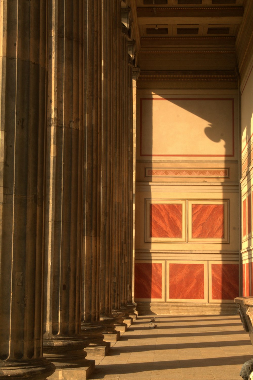 a long row of pillars in a building