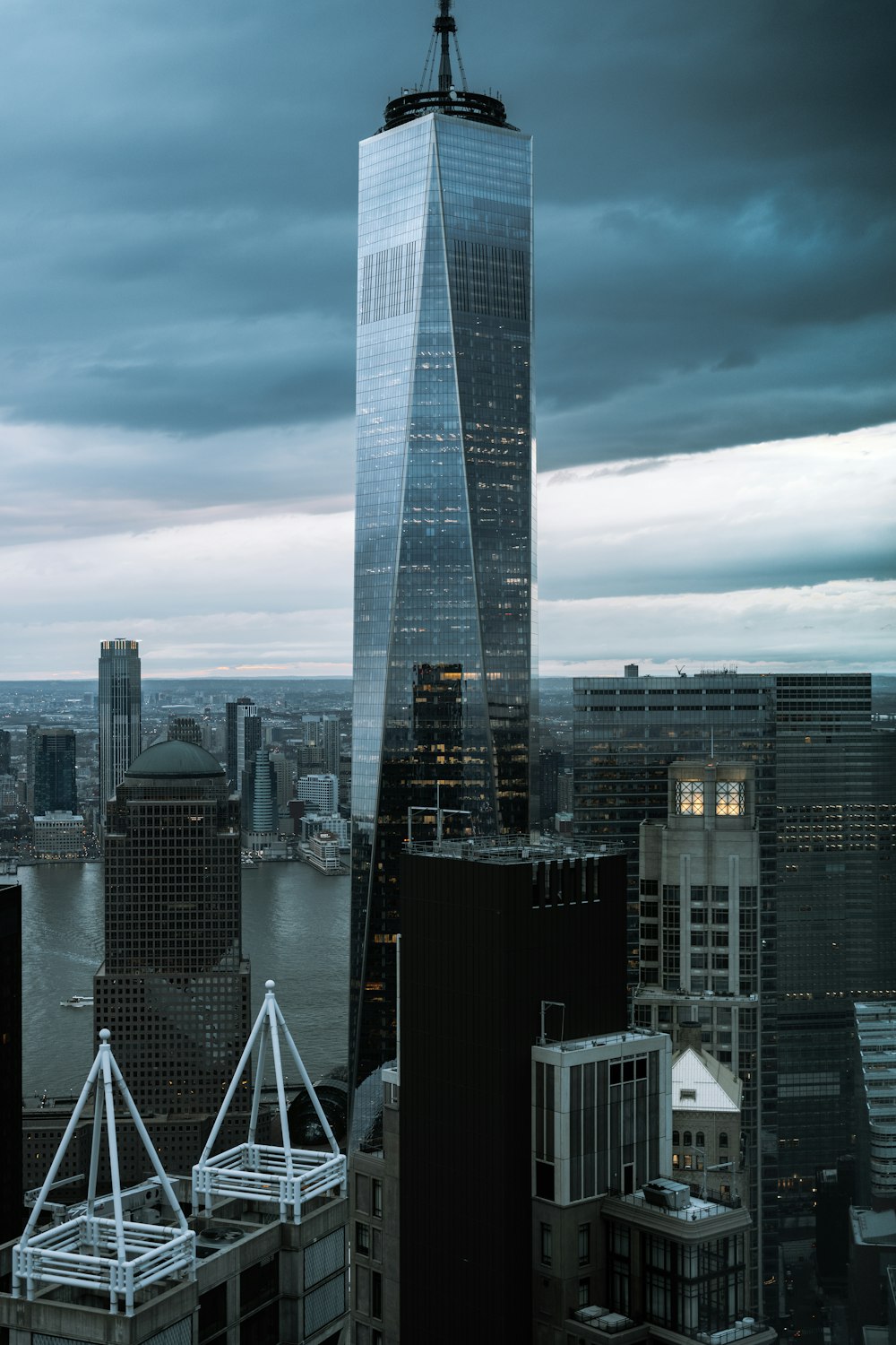 a very tall building towering over a city