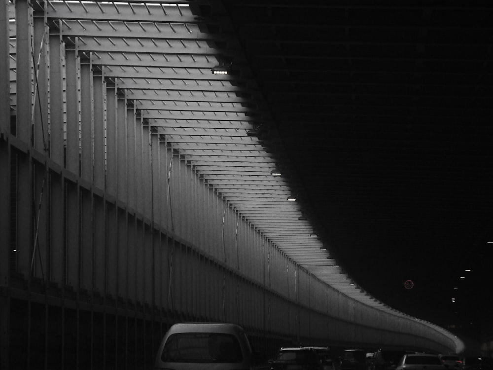 a black and white photo of a train station