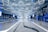 Modern commercial building interior showcasing sleek epoxy flooring and elegant lighting.