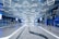 Modern commercial building interior showcasing sleek epoxy flooring and elegant lighting.
