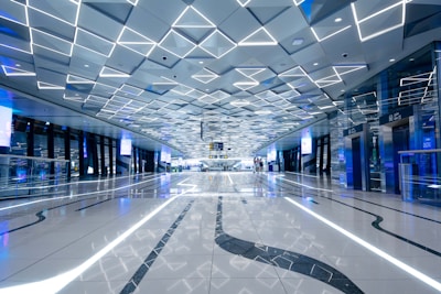 A sleek, modern office space with navy blue and gold accents reflecting a luxury tech atmosphere.