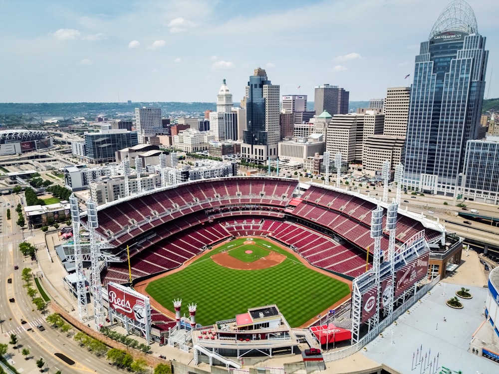 an aerial view of a baseball stadium in a city