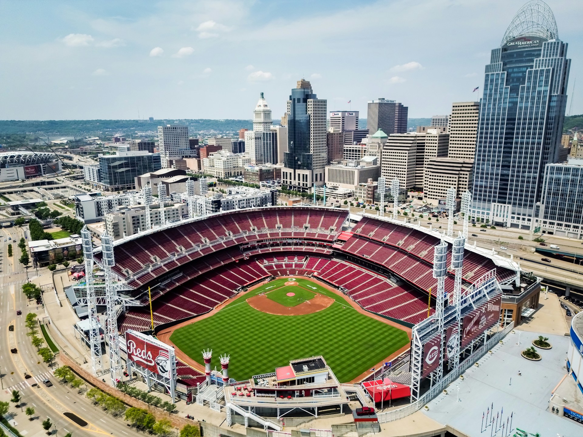 an aerial view of a baseball stadium in a city