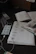 A creative workspace with a notebook, smartphone, and video clip storyboard sketches.