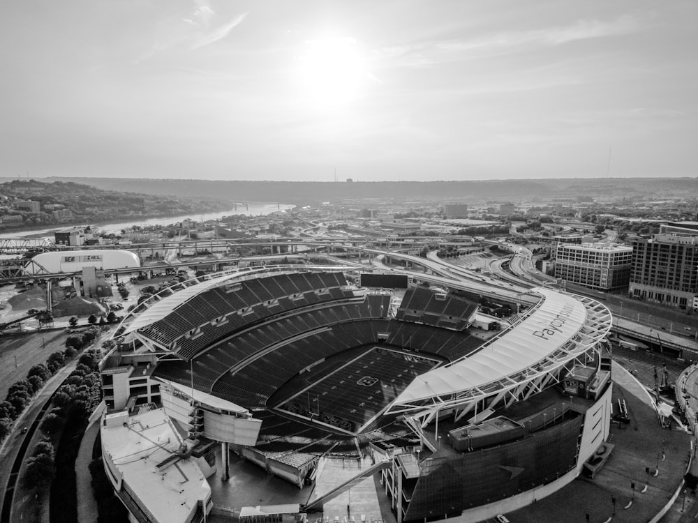 an aerial view of a football stadium in black and white