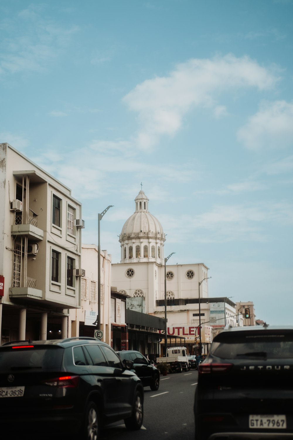 a city street filled with lots of traffic