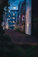 Cozy residential unit exterior with warm lighting at dusk.