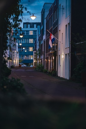 Cozy residential unit exterior with warm lighting at dusk.