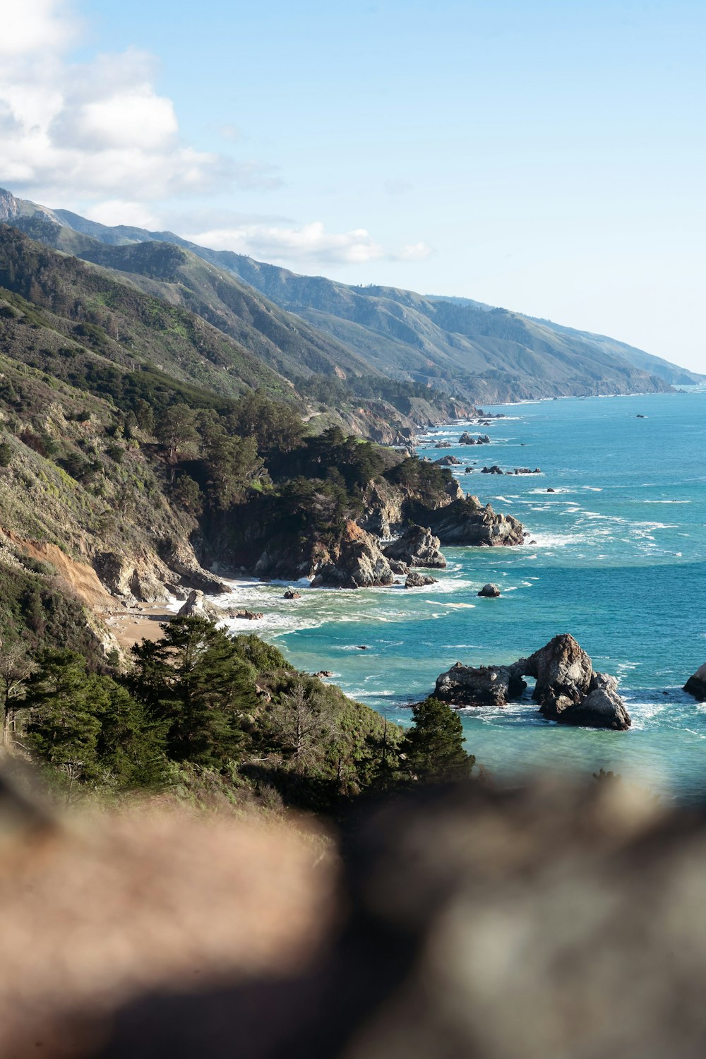 a view of the ocean from a cliff