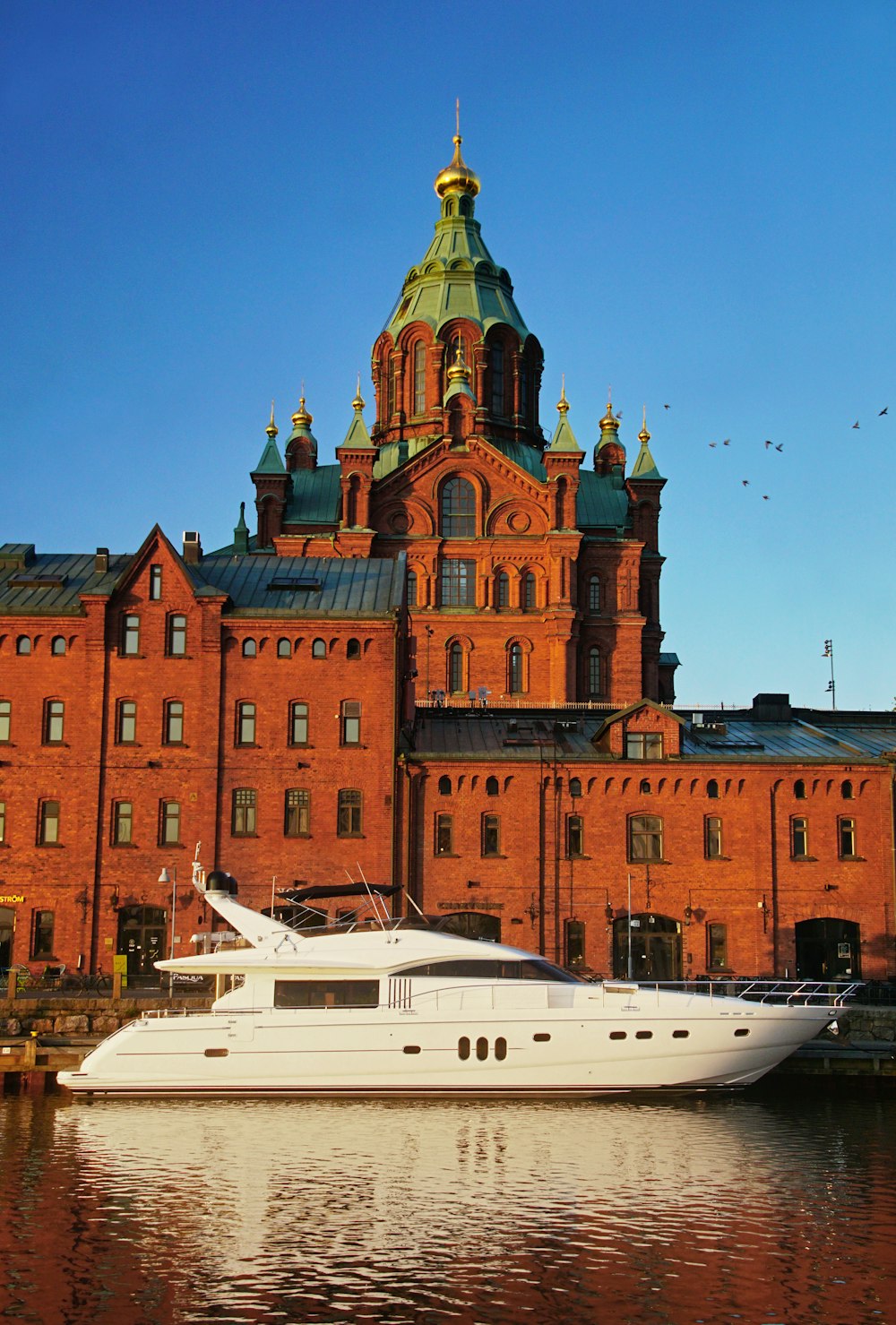 a large white boat in a body of water